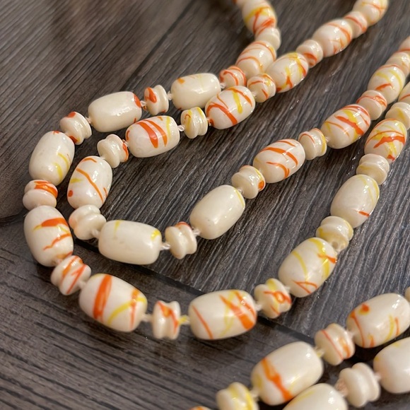 Vintage Beaded Necklace Ivory with Orange and Yellow Paint Splatter Design - Picture 3 of 13